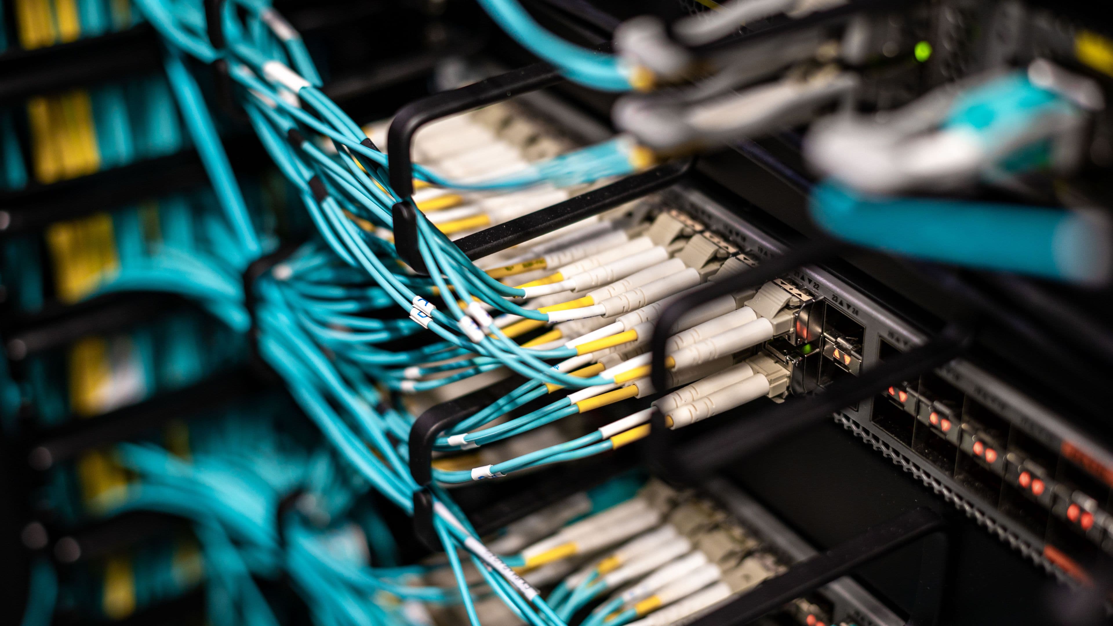 Fibre patch cables terminated in a network rack